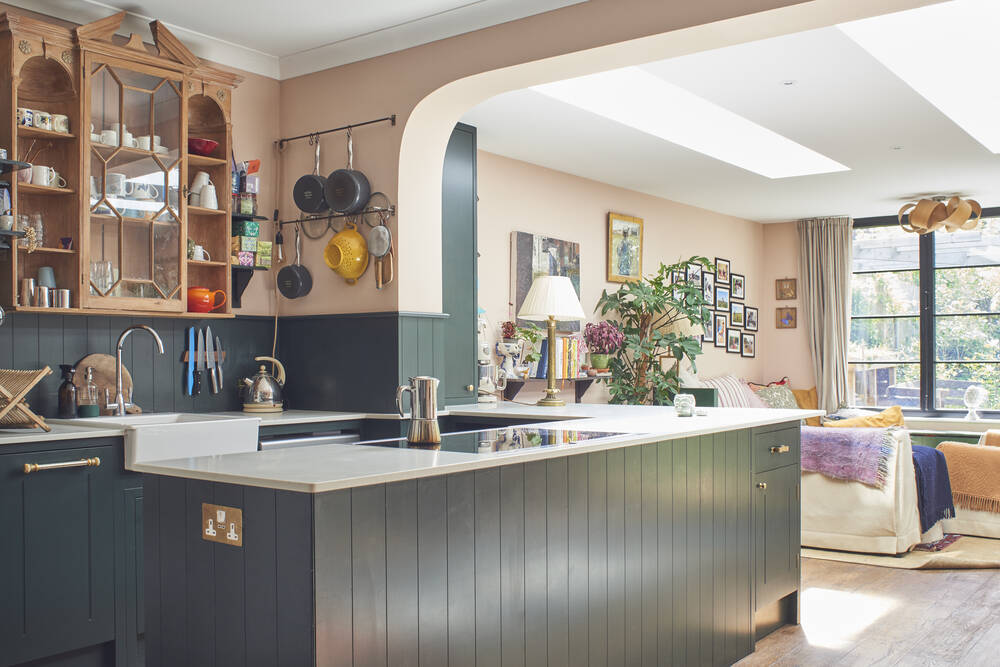 A green kitchen island